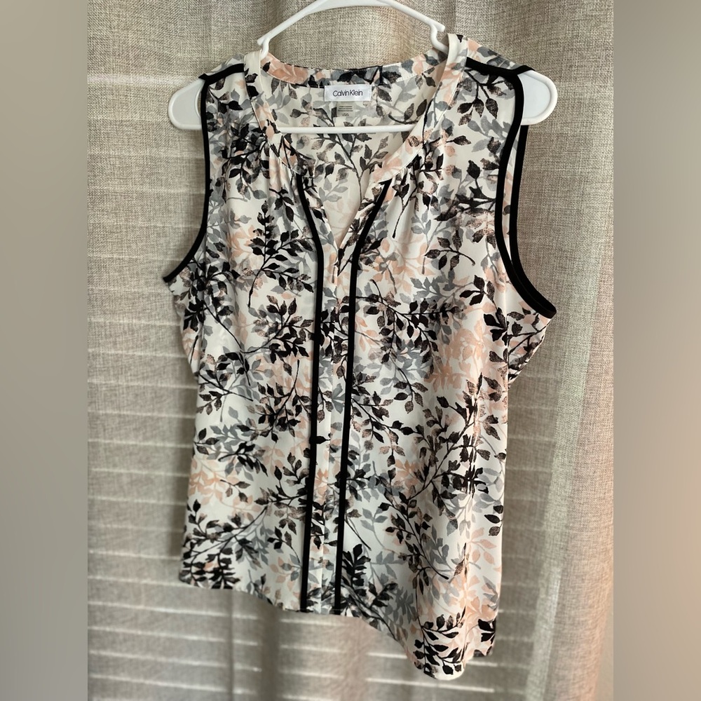 Cleaning out closets! Check out my recent posts for lots of womens tops!